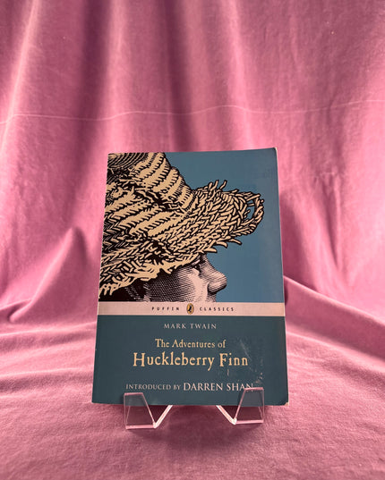 The Adventures of Huckleberry Finn (Puffin Classics) by Mark Twain