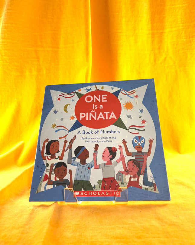 One Is A Piñata by Roseanne Thong