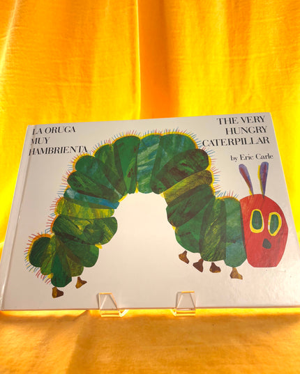 The Very Hungry Caterpillar/La oruga muy hambrienta (World of Eric Carle) by Eric Carle