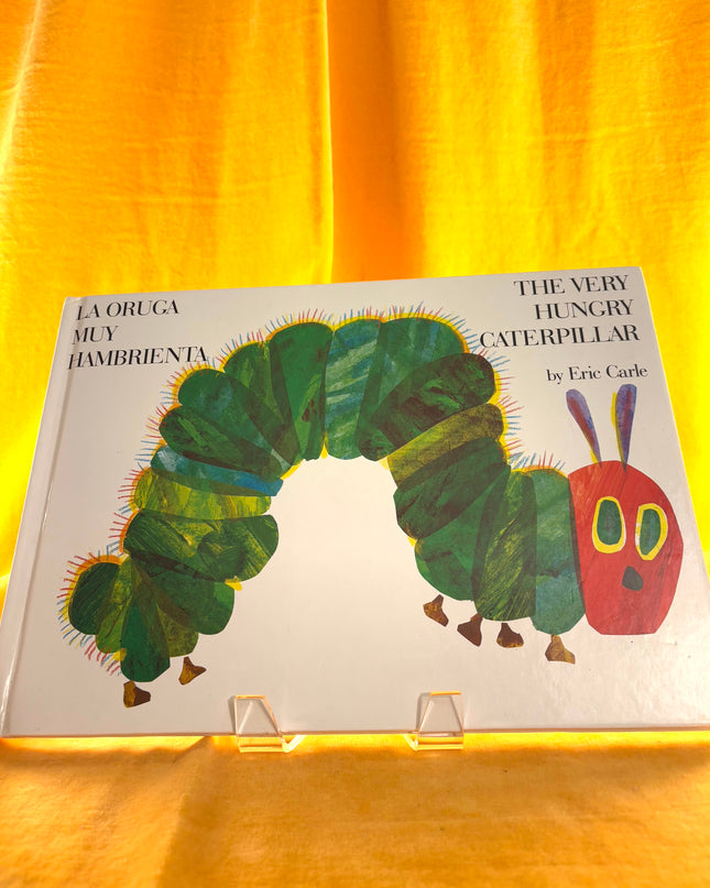The Very Hungry Caterpillar/La oruga muy hambrienta (World of Eric Carle) by Eric Carle