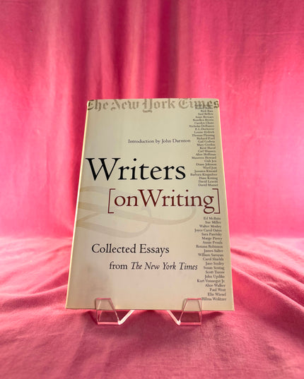 Book titled 'Writers on Writing' by The New York Times on a pink background