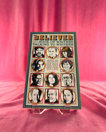 Book titled 'Believer: Book of Writers Talking to Writers' on a pink background