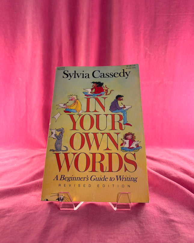 Book titled 'In Your Own Words' by Sylvia Cassedy on a pink background