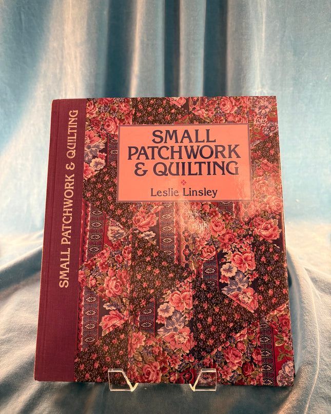 Book titled 'Small Patchwork & Quilting' by Leslie Lindsey on a textured surface