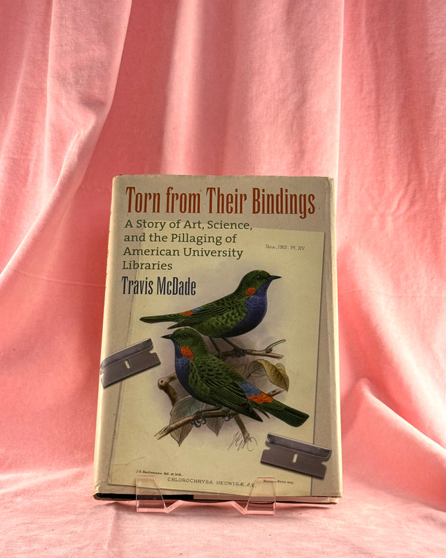 Torn from their Bindings: A Story of Art, Science, and the Pillaging of American University Libraries by Travis McDade