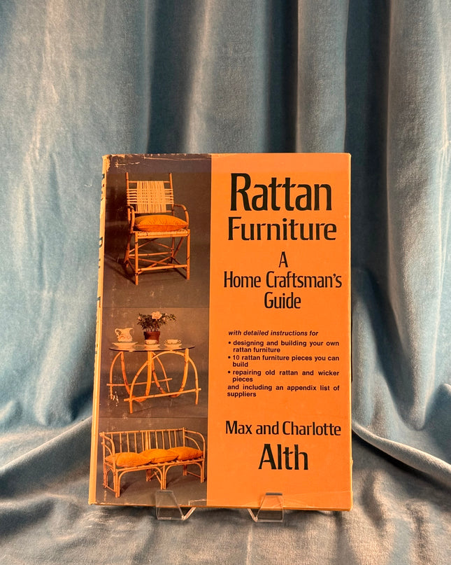 Book titled 'Rattan Furniture: A Home Craftsman's Guide' by Max and Charlotte Alth on a gray fabric background