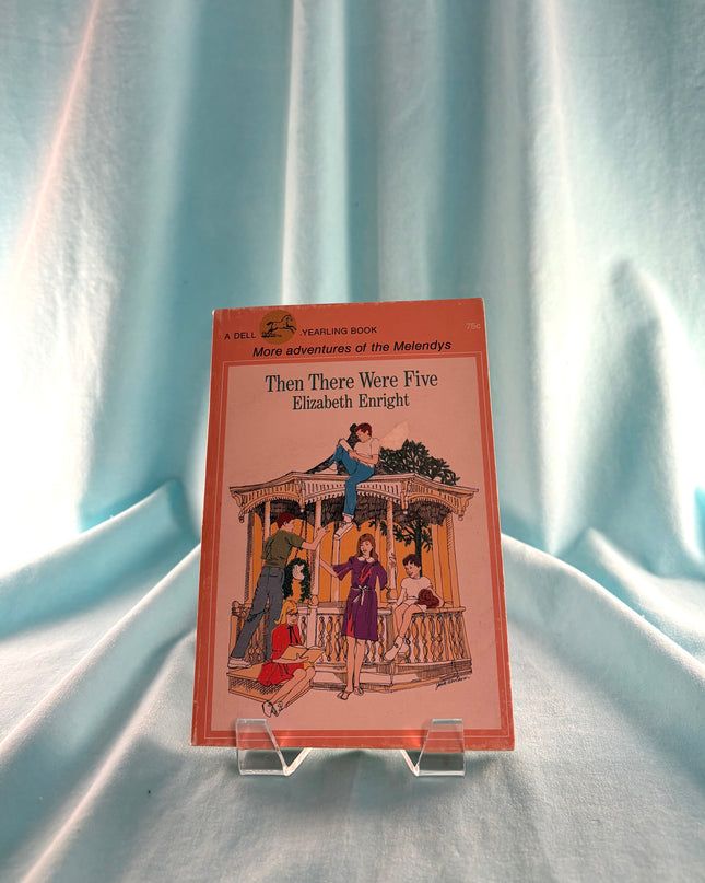 Book titled 'Then There Were Five' by Elizabeth Enright on a light blue fabric background