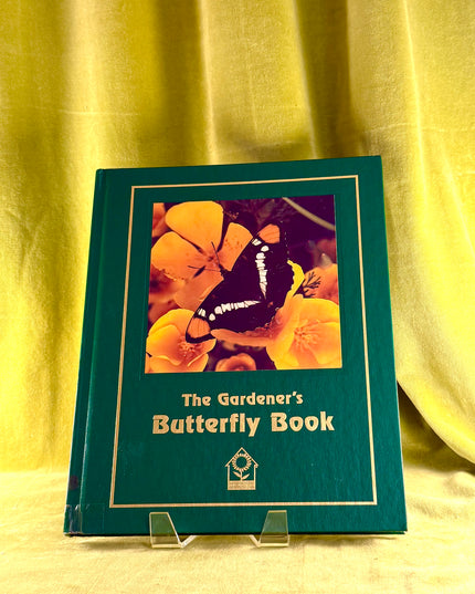 Book titled 'The Gardener's Butterfly Book' with a butterfly illustration on a green background.