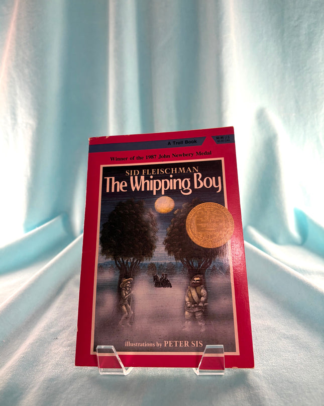 Book titled 'The Whipping Boy' by Sid Fleischman on a white background
