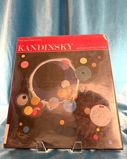 Kandinsky coloring book on a blue fabric background