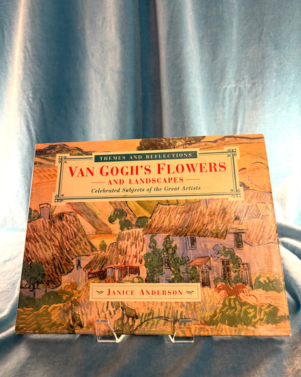 Book titled 'Van Gogh's Flowers and Landscapes' by Janice Anderson on a blue fabric background