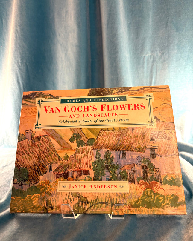 Book titled 'Van Gogh's Flowers and Landscapes' by Janice Anderson on a blue fabric background